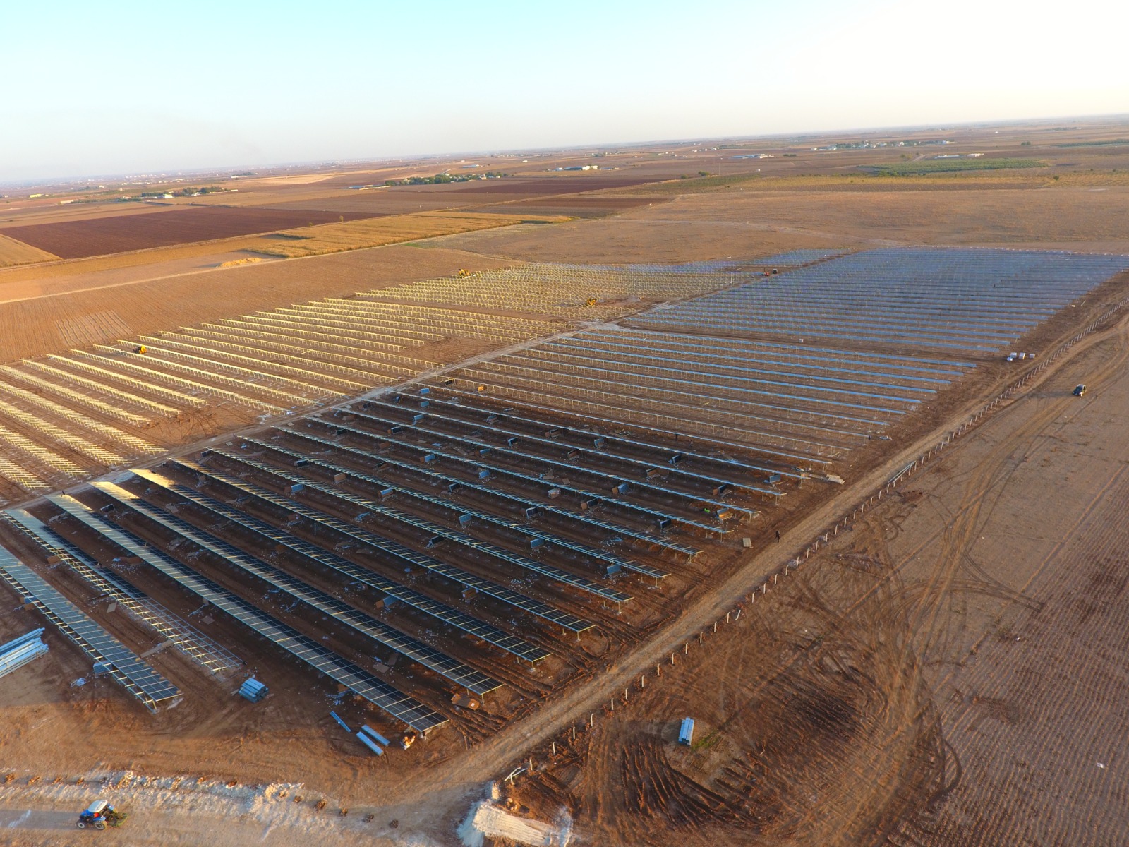58 MW solar farm golden hour aerial